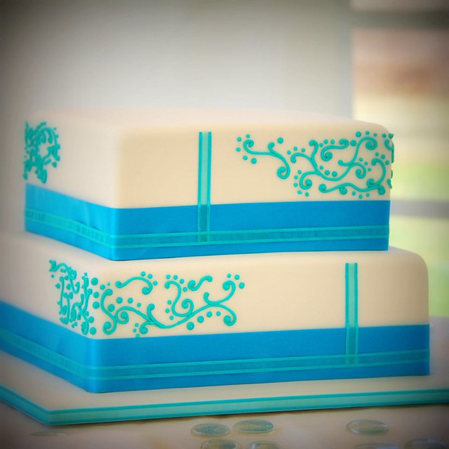 Piped Wedding Cake Both tiers are chocolate mud cake decorated with teal 