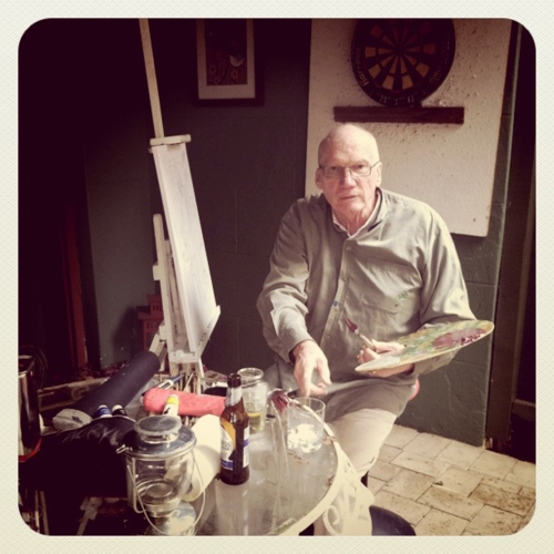 Dad at his easel in our courtyard