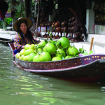 Woman selling local tropical fruit in a floating market 