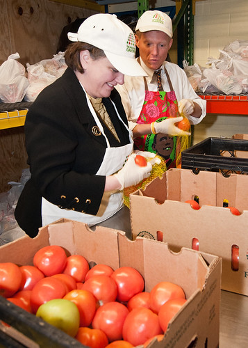 Dr. Kathleen Merrigan (left), Deputy Secretary and Max Finberg (right), Director, Center for Faith Based and Neighborhood Partnerships fill mesh bags with tomatoes at the Arlington Food Assistance Center in Arlington, Virginia, Thursday, January 12, 2012. Agriculture Secretary Tom Vilsack designated January 12 as the United States Department of Agriculture’s Martin Luther King Day of Service to recognize Dr. King’s contributions to the Civil Rights Movement. The volunteer service at the Arlington Food Assistance Center addresses hunger in the Latino community and how the United States Department of Agriculture is working via today’s day of service, but also through larger efforts to increase participation in our nutrition assistance programs. USDA Photo by Bob Nichols