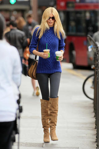 Claudia Schiffer in knee-high boots