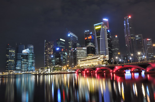 Singapore skyline and bridge at night