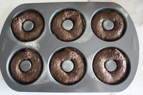 Chocolate donuts with blood orange glaze