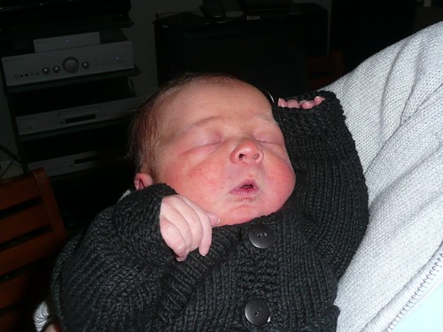 Rave baby! (Leon with his hands in the air, aged 1 day)