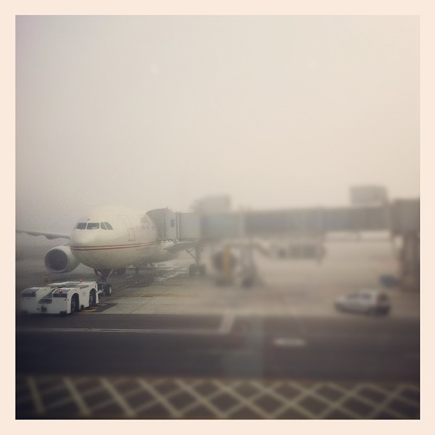 In foggy Abu Dhabi waiting to be able to board our flight to JFK.