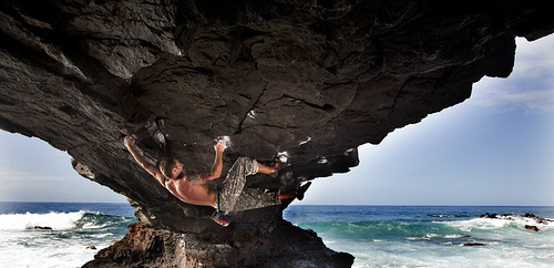 Justin Ridgely dances under the Arch, Oahu, Hawaii.
