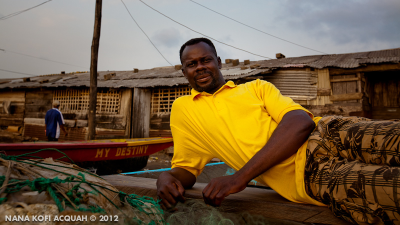 Beninoise Fisherman rests on his canoe in Cameroon