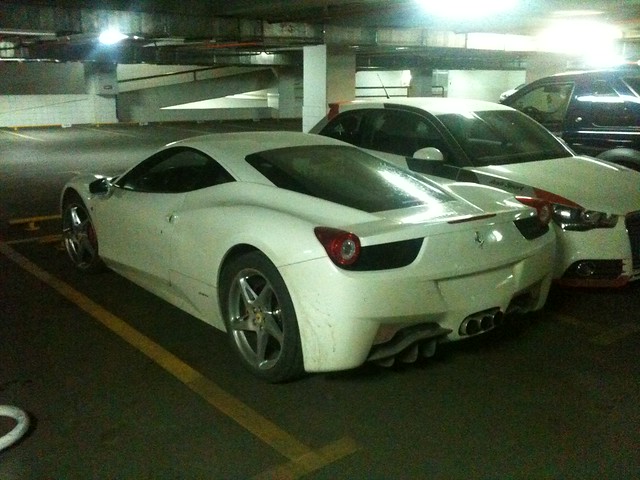 White Ferrari 458 Italia Parked in the underground private residence of 