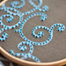 french knots on delicious fabric