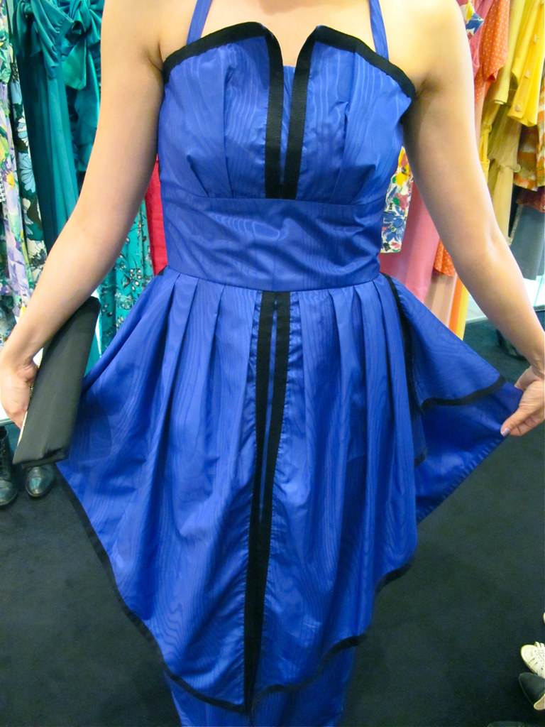 Gorgeous black piping sets off the royal blue on this formal gown. Check it.
