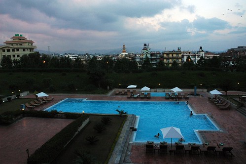View of Boudha Stupa over the Hilton swimming pool, Hyatt Regency Kathmandu, Boudha, Kathmandu, Nepal by Wonderlane
