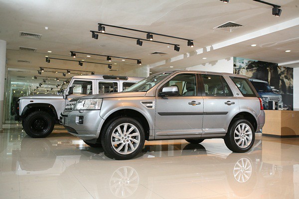 A Defender Stationwagon (L) and Freelander 2 on display in the Land Rover section of the new showroom