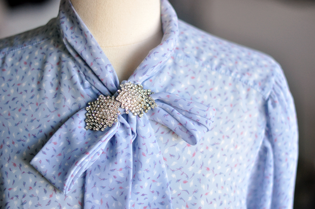 rhinestone brooch  diy pinned on a bow blouse