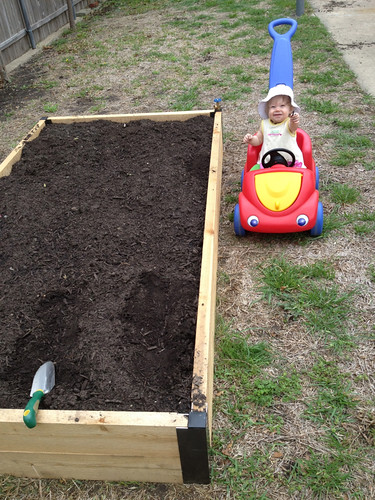 Helping mommy plant (eating dirt)!