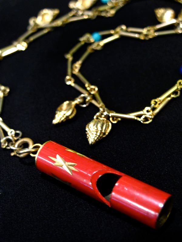 Phee-yoo-weet! Red whistle pendant on a chain with charms