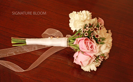Spring wedding floral light pink spray rose white spray carnation and 