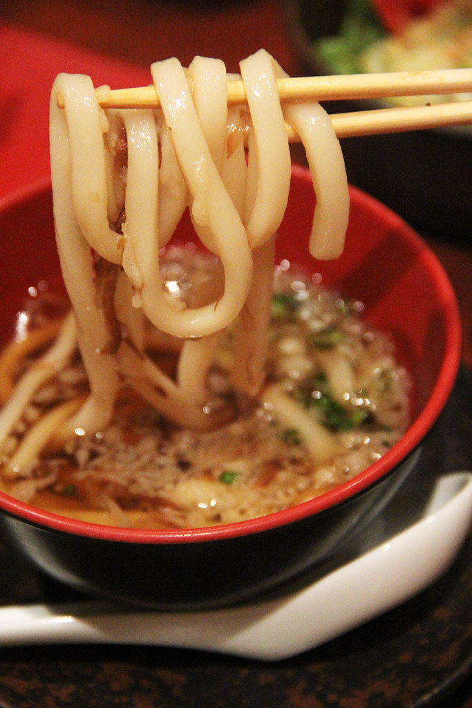 Slurping down a bowl of udon noodles