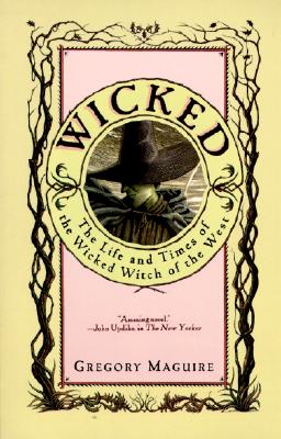 cover of the book Wicked, featuring an illustration of a woman's head. Her skin is green and she's wearing a black hat