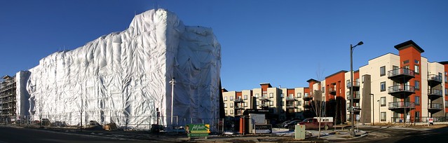 An entire apartment complex covered in plastic.