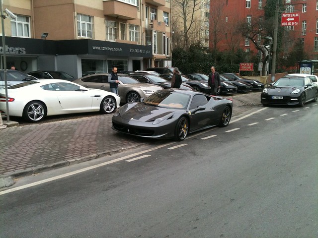 Grey Ferrari 458 Italia Found parked outside a sports dealership 