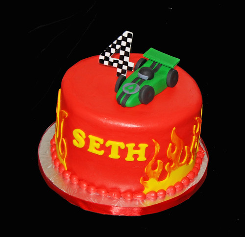 4th race car themed birthday cake with flames