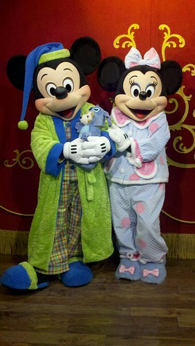 Mickey Mouse and Minnie Mouse in their pajamas in Town Square Theater - One More Disney Day