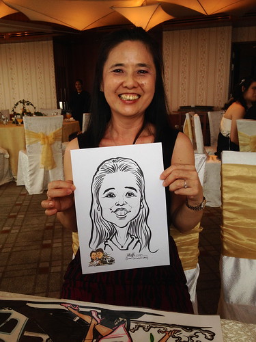 caricature live sketching for a wedding solemnization