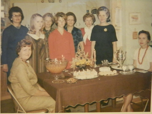 1965 cousin's wedding anniversary I am standing in brown dress with long