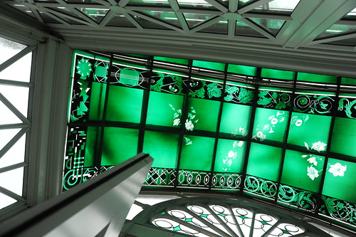 Complex design of the green white and black stained glass window in the Seattle Volunteer Park Conservatory, Capitol Hill, Seattle, Washington, USA by Wonderlane