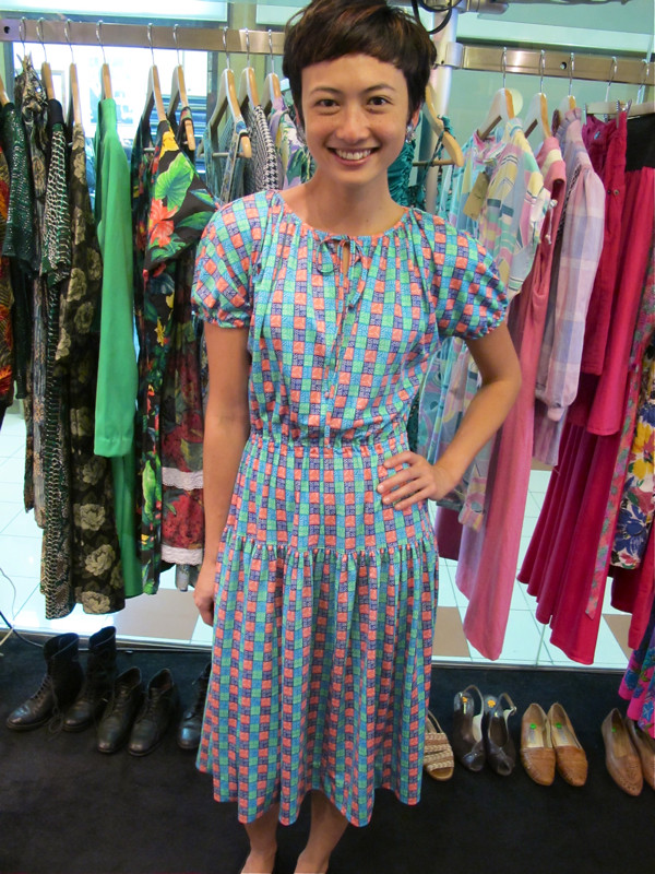 Its a French 1970s dress from Paris, in lovely hues of pink, green and blue. We dig!