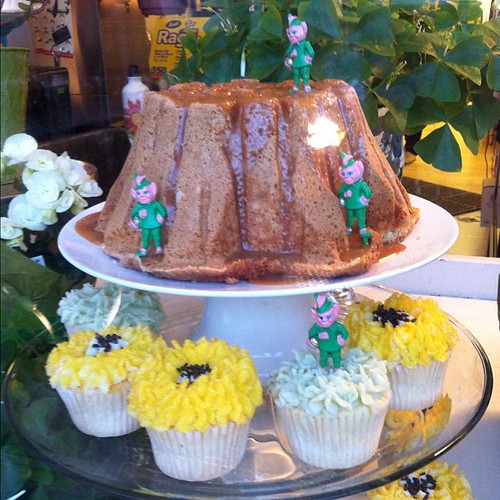 St. Patty cupcakes and stump shaped cake.