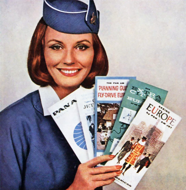 1963-Pan-Am-Flight-Attendant-with-brochures