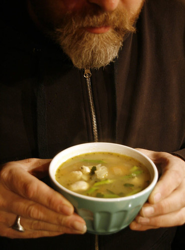 Holding soup in bowl