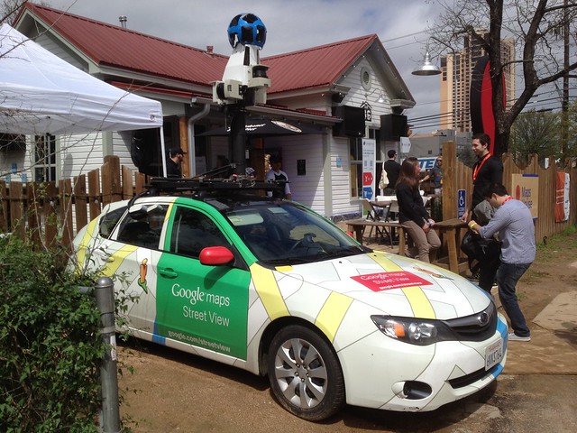 Google Streetview car in the Google Village