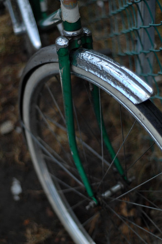 green bike, front wheel