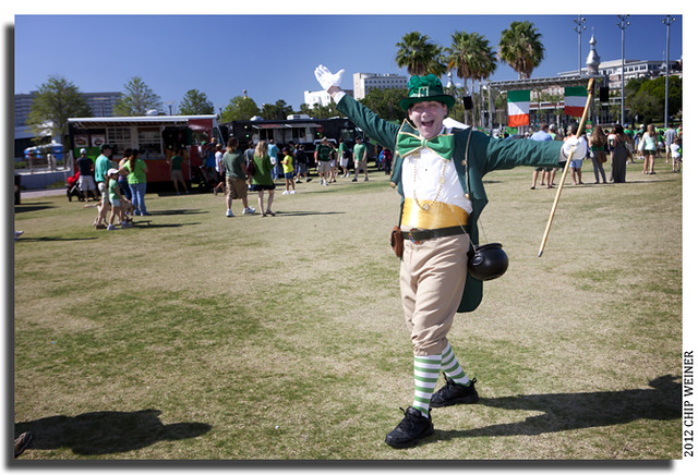 Tall leprechaun, Mike Norton as Patty O'Furniture, posed and entertained at the Green River Fest. 