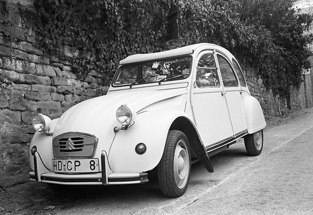 An old Citro n 2CV from 1949 parked in the beginning of the highly sloped 