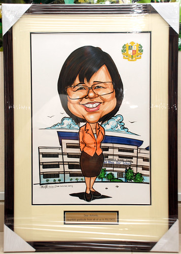 Caricature for Principle of St. Gabriel's Primary School - framed up with metal engraving plate
