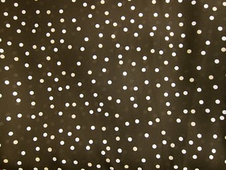 Brown and cream polka dot poly georgette