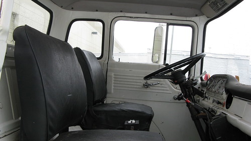 Cab interior photo taken inside a 1974 Ford 750 ustom Cab tow truck