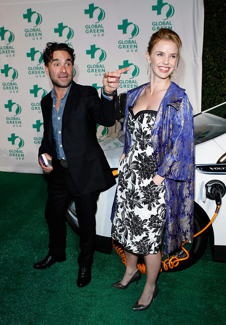 Actors Johnny Galecki L and Kelli Garner on the green carpet with a 2012 