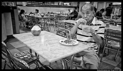 Chinese man with Indian curry