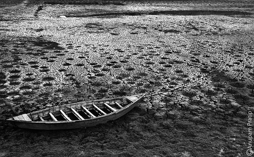 Lonely boat on desert