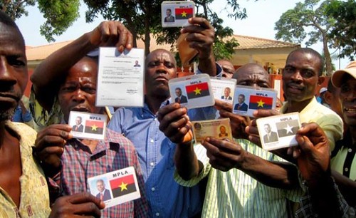 Angolan veteran soldiers flashing their MPLA membership cards during a demonstration demanding compensation for military service. Angola has been the focus of substantial economic investment in recent years. by Pan-African News Wire File Photos