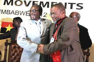 Zimbabwe President Robert Mugabe greets ANC Secretary General Manatshe at a summit of former liberation movements in the region. Zimbabwe wons its independence in 1980 and South Africa in 1994. by Pan-African News Wire File Photos