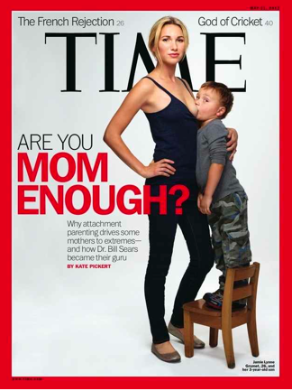 A cover of Time magazine featuring a young thin white woman defiantly staring at the camera as she breastfeeds her three year old. He is standing on a chair, mouth pressed against her one exposed breast, and is also looking at the camera. The headline reads, Are You Mom Enough?