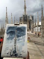 Sketching at top of Duomo Cathedral Milan in a thunderstorm
