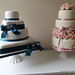Four Tier Teal Brooch Wedding Cake and Three Tier Roses Wedding Cake.jpg