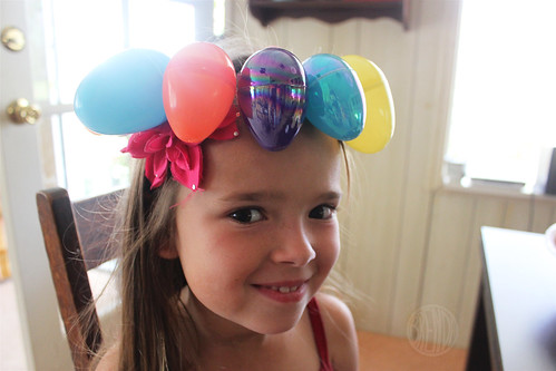 child wearing an Easter egg crown