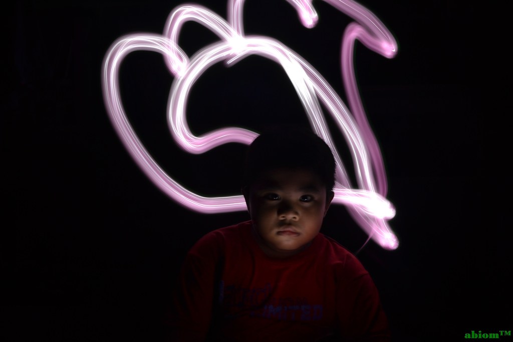 Playing light with my son, faris, in dark room